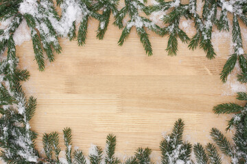 Branches Of Spruce With Snowflake On Board Top View.