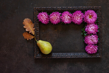 Autumn pattern frame with asters and pear