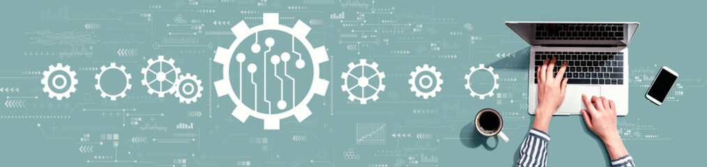 Automation concept with person using a laptop computer