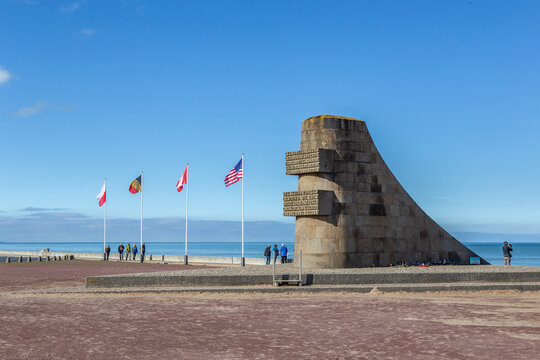 The omaha beach in Normandy, France, on a sunny day.