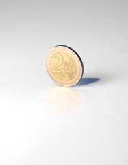 Currency - 2 Euro Coin on White Background with Copy Space
