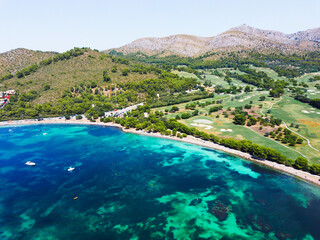 view of the sea and mountains of mallorca golf club