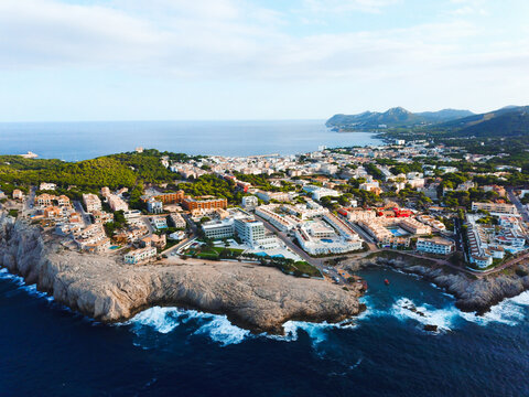 Aerial view of touristic apartments and hotels in Cala Agulla in Majorca, Spain