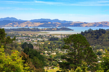 Fototapeta na wymiar Panoramic view of the small town of Coromandel, New Zealand, seen from the surrounding mountains