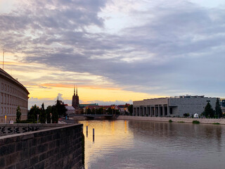 The promenade of Wroclaw - European Capital of Culture, view from river Odra, after sunset at night. Poland