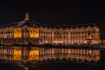 Fototapeta na wymiar The water mirror plaza in Bordeaux, at nigh.