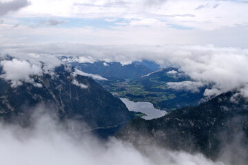 Fototapeta na wymiar This is a view of Lake Hallstatt and Hallstatt itself. From a bird's eye view.Tourism in Austria. The Alps are a popular tourist destination in both winter and summer. Altitude 2100 m. Europe. 