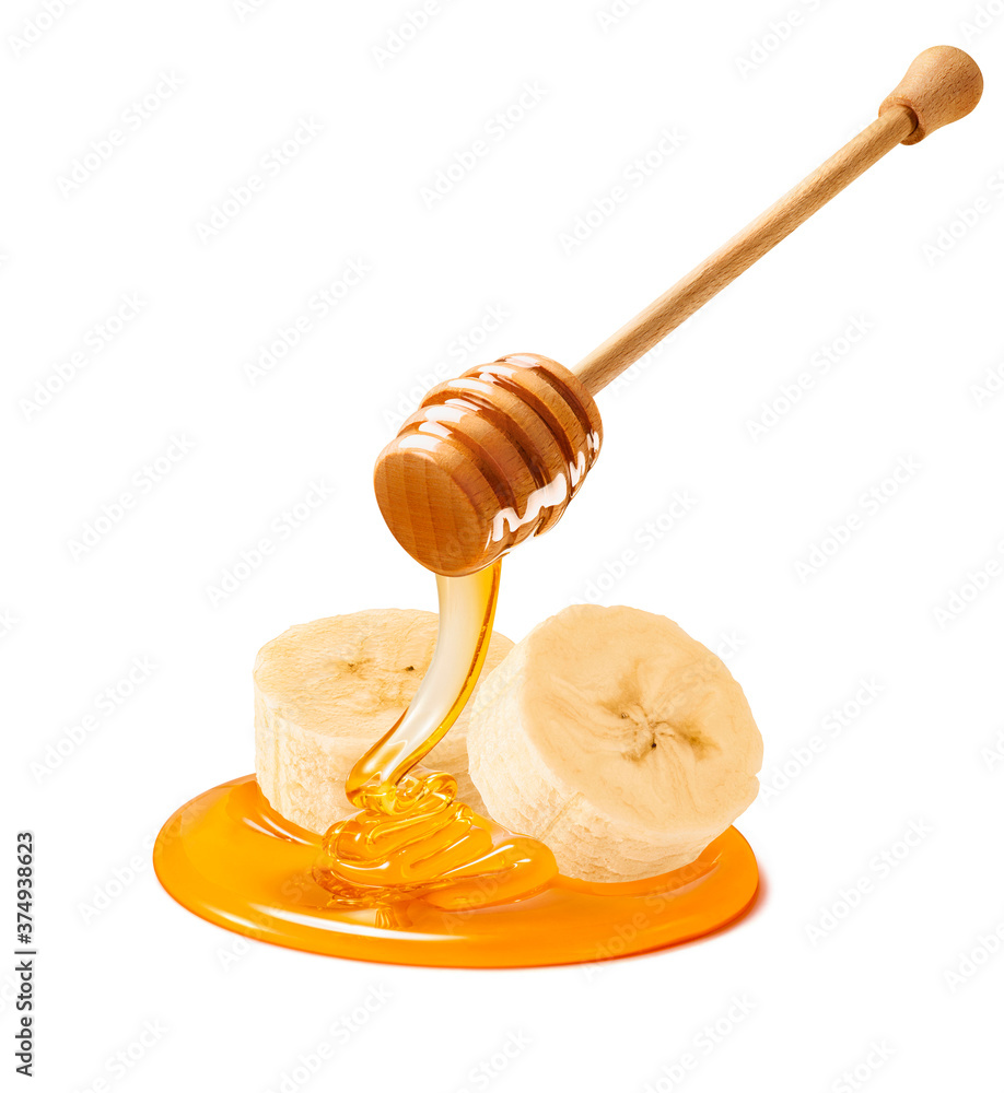 Wall mural banana slices and honey dipper isolated on white background