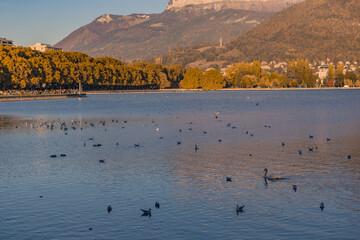 Sunset view of the lake Annecy, along the Alps, in France.