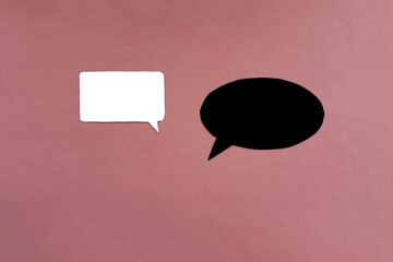 Oval for white and black text on a pink background. The concept of dialogue and information...