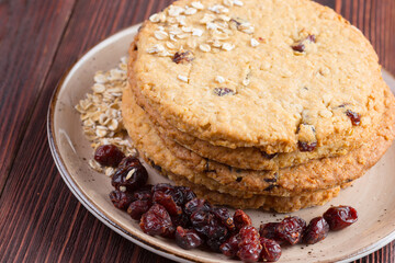 Oat cookies served on wooden table close up