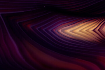 Iridescent natural transparent glossy geode and magic geometric Agate crystal stucture through sun light.