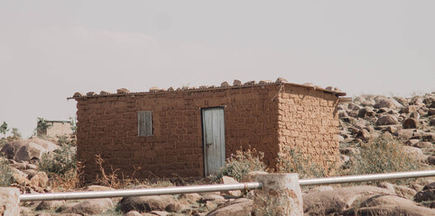 Abandoned mud house in the countryside
