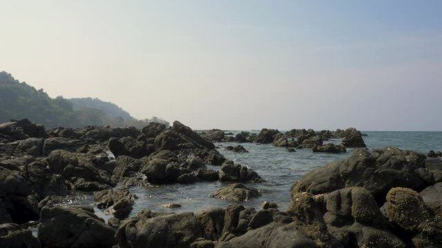 rocky tropical beach in 
nagapali myanmar