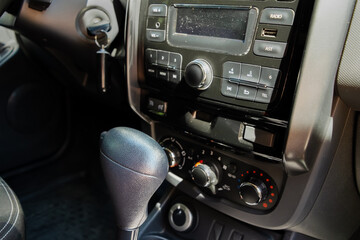 A gear lever in a passenger car