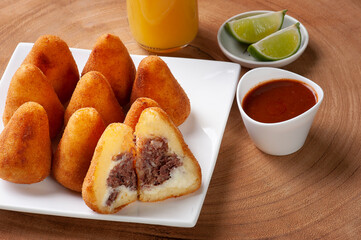Dried beef coxinha. Appetizer of Brazilian cuisine served in bars and parties.
