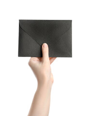 Woman holding black paper envelope on white background, closeup