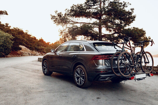 Crossover Car With Two Road Bicycles Loaded On A Rack