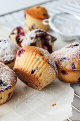 Currant muffins sprinkled with powdered sugar