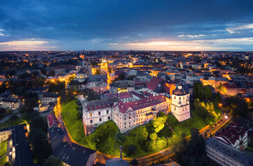 Fototapeta na wymiar Lublin, Poland. Aerial view of Old Town at dusk with historic Dominican Abbey on foreground