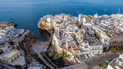 Aerial view of Polignano a Mare, a village built on the edge of the cliffs above the Adriatic Sea in Apulia, Italy (southeast) - Beach of Lama Monachile and marine caves of Grotta Piana © Alexandre ROSA