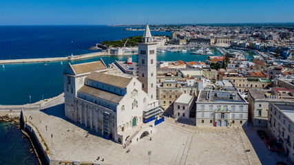 Aerial view of Trani in the southeastern region of Apulia in Italy - Cathedral of San Nicola Pellegrino on the coast of the Adriatic Sea - obrazy, fototapety, plakaty