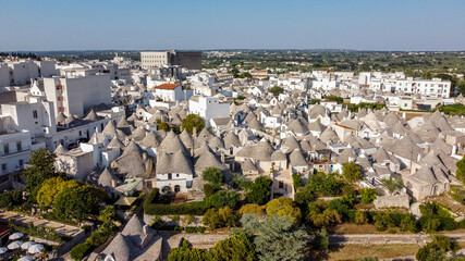 Aerial view of the Trulli of Albarobello in the south of Italy - Traditional Apulian dry stone huts with a conical roof specific to the Itria Valley, in the Murge area of the Italian region of Apulia