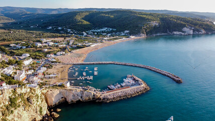 Aerial view of the bay of Peschici on the Gargano peninsula in Italy - Village built on a rocky...