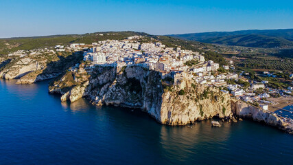 Aerial view of the cliffs of Peschici on the Gargano peninsula in Italy - Village built on a rocky overlook in the Adriatic Sea