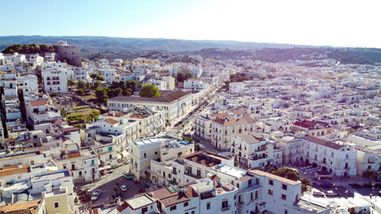 Fototapeta premium Aerial view of Vieste on the Gargano Peninsula in Italy - Large avenue in the sunset