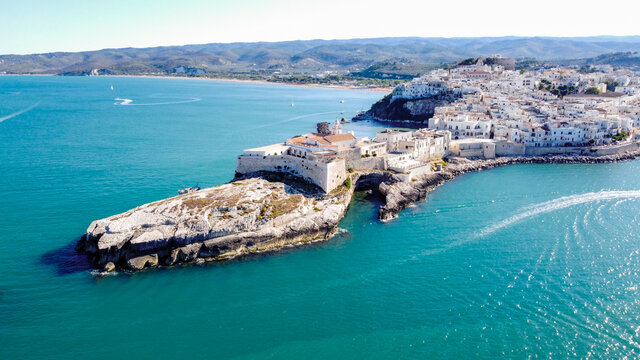 Aerial view of Vieste on the Gargano Peninsula in Italy - Medieval city with white buildings built on a narrow peninsula over the Adriatic Sea