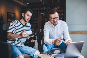 Freelancers using laptop for work on project