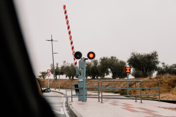 Opening Railway barriers at the level crossing in Spain