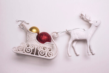 christmas tree sled, balls and reindeer on white background