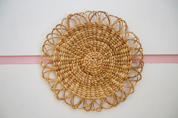 Rattan basket wall decor bohemian style. Eco friendly trendy room decoration.