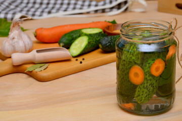 pickle jar and canning ingredients in the kitchen