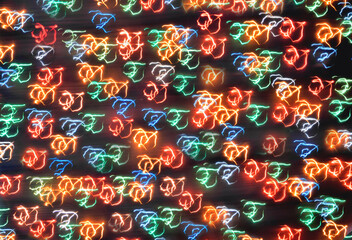 Fototapeta premium multicolored lights on a dark brown background, blank for creativity, background or texture, new year lights close-up