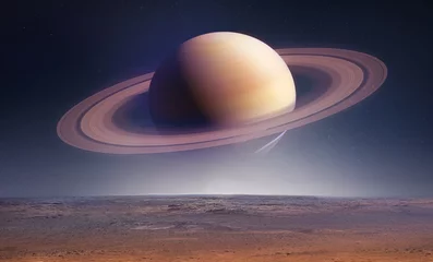 Zelfklevend Fotobehang Landschap met Saturnus planeet in de lucht met sterren. Fantasie ruimtebehang met planeet over het land. Sciencefiction. Elementen van deze afbeelding geleverd door NASA © dimazel