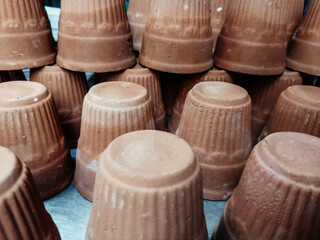 Image of cups made of mud or sand called kulhad/kullhad used to serve authentic indian drinks...