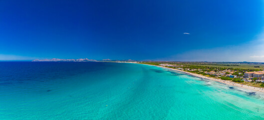 Fototapeta na wymiar Aerial view of a coast line with beach in playa de Muro, Mallorca, Spain
