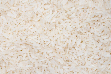 long grain rice pattern. top view jasmin rice background and texture.