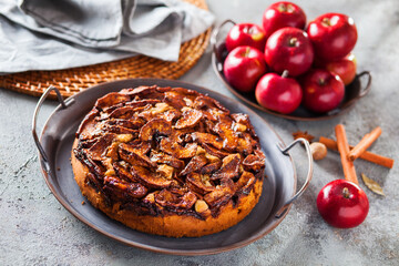 apple pie and fresh apples and spices