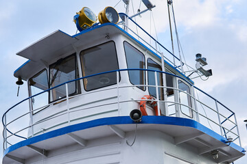 wheelhouse of a small river tug © Evgeny