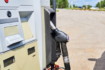 refueling gun in the fuel dispenser socket