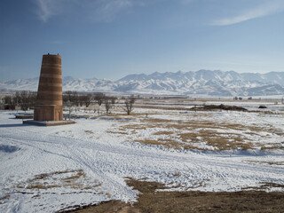 Burana Tower and Mountain Range near Tokmok, Kyrgyzstan