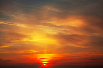Naklejka na ściany i meble Sunset on the red sky . Fantastic scenery with sundown