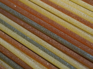 close up of colorful tricolor spaghetti pasta