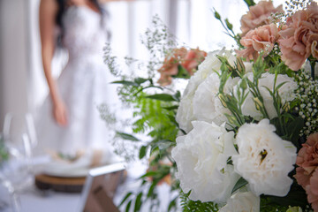 bride and bouquet of flowers before the wedding