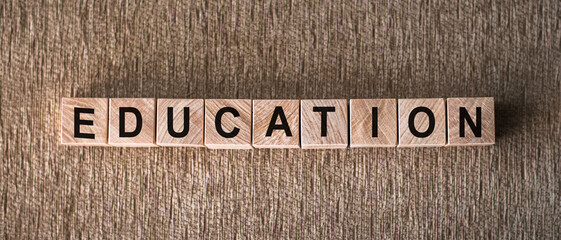 Education word written on wooden letters blocks