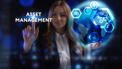 Business, Technology, Internet and network concept. Young businessman working on a virtual screen of the future and sees the inscription: Asset management